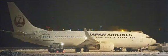 ENGINE FIRE FORCES EVACUATION OF JAL PLANE