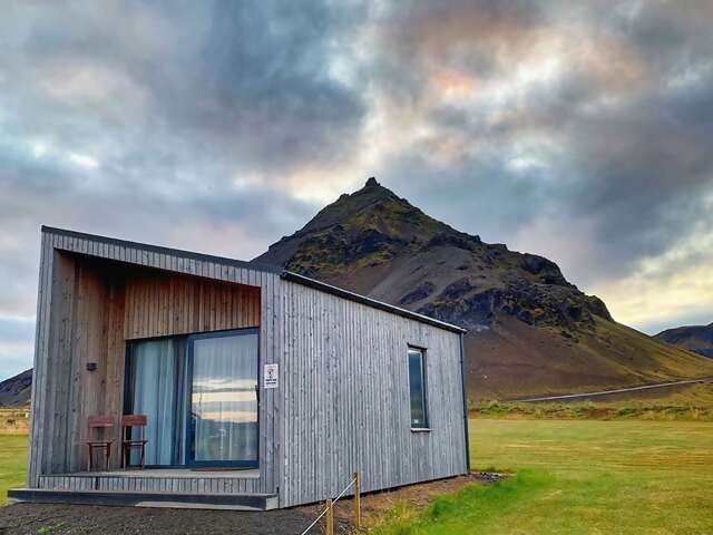 Cozy and amazed is a rare combination, but not for guests of these remote cottages on the Snæfellsnes Peninsula