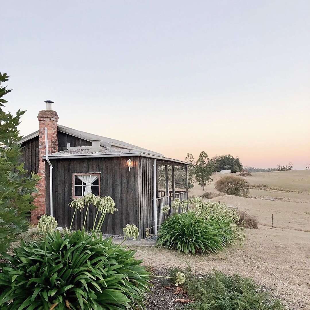Cassie’s restored 1940s cabin sits on 140 acres of tranquil vineyard and farmland