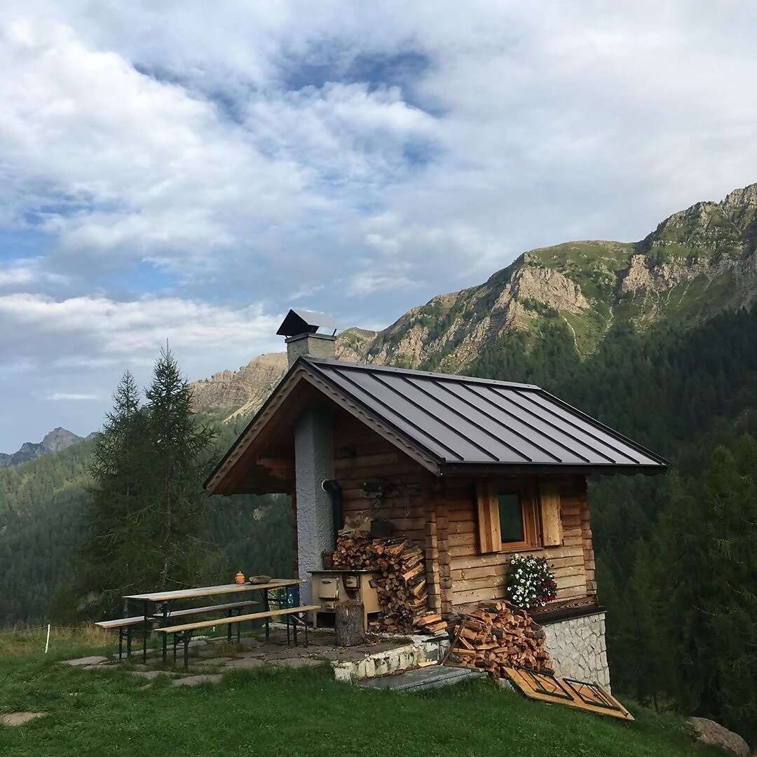 At Superhost Moreno’s tiny baita (Alpine hut), the only sounds you’ll hear are the wind through the valley and the distant chimin
